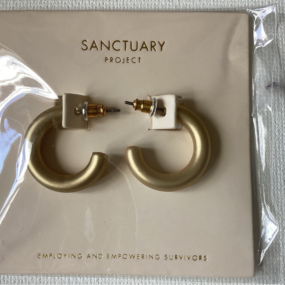 The Sanctuary Project Gold Hoop earrings.